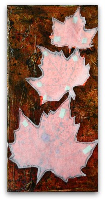 Protect the leaves by masking them off with leaf shaped masks.  Use tape to hold the masks in place.