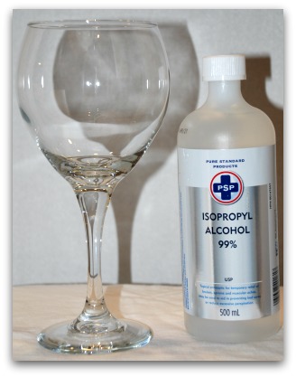 Wipe down the wine glasses with rubbing alcohol