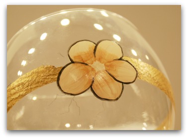 Use the #8 flat to shade the base of each petal with a mix of Natural Buff and Milk Chocolate.