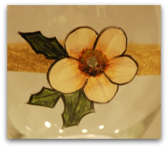 Use the deerfoot brush to first stipple the flower center with Milk Chocolate.  Also, using the filbert this time, basecoat the leaves with a mix of Black and Avocado.