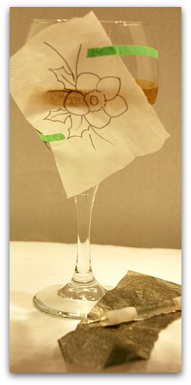 Transfer the design to the glass using the tracing and graphite paper.